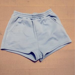Blue sweat shorts.